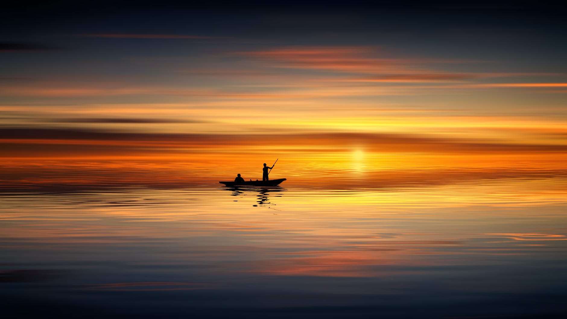 photo of people on rowboat during sunset